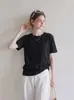 Camiseta básica versátil preta de gola redonda, ombros normais, manga curta para mulheres, toque de verão de alta qualidade, modelagem solta, top de manga meia que afina