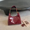 Bolsa pingente da moda, simples e versátil para o dia a dia, novo estilo retrô, de mão, bolsa de ombro, estilo coreano para o outono de 2026, bolsa transversal feminina, bolsa de axila