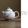 La nueva tetera de cerámica de Miyuan está pintada a mano con flores de cerezo y conejitos lindos, una tetera individual con filtro de bola para uso doméstico, un juego de té para mujeres