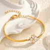 Estilo Lujo Ligero Pulsera de Acero de Titanio con Forma de Corazón y Trébol de Cuatro Hojas con Circonita Acero Inoxidable Color Duradero Joyería Galvanizada al Vacío Pulsera Elegante