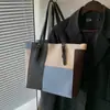 Bolsa Tote de Grande Capacidade para Deslocamento Transfronteiriço Bolsa de Ombro Feminina 2026 Novo Estilo Tendência Manuseada Textura Estética Bolsa Grande bolsas