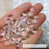 Venta al por mayor a través del fondo del diamante desnudo blanco glaciar joyería para uñas hielo a través de la roca caramelo corazón torcido transparente fondo puntiagudo diamante de uña decoración de diamante grande
