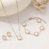 Conjunto de joias pulseira trevo de cinco folhas cinco flores transfronteiriço colar brincos conjunto de três peças luxo leve alta qualidade fabricantes de joias atacado