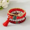 Bestseller transfronterizo estilo bohemio ojo turco borla colgante pulsera multicapa cordón elástico pulsera de cuentas
