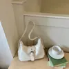 Bolso de Hombro Versátil de Gama Alta para Mujer 2026 Nuevo Estilo Retro de Motocicleta Bolso de Mano Versátil de Moda