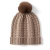 Gorro de lana de cachemira para mujer, nuevo gorro de invierno de punto con bola de pelo de flores retorcidas Baotou, grueso y cálido, con protección para las orejas.