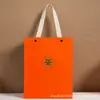 Bolsa de presente de chá laranja com carimbo dourado de alta qualidade, bolsa de mão de chá vermelho, chá preto, chá verde, pacote de 0,5 kg de chá Pu'er, bolsa de presente de chá de cor sólida