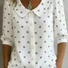 Nova Camisa Europeia e Americana Cruzada Amazon Primavera/Verão 2026 Solta Casual Vintage Botão Bordado Floral Manga Média