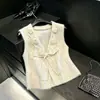Mi chaleco de punto calado floral tridimensional estilo francés favorito, versátil para usar en capas, un hermoso suéter