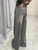 Tendencia Hong Kong estilo mujeres verano y principios de otoño 2026 nueva colección: jeans únicos, de pierna recta, corte holgado, estilo hip-hop, moda de alta calle, pantalones largos