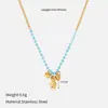 Collar de cuentas azules para mujer con un colgante de corazón y mariposa dorados, cadena para la clavícula con un diseño único que no se decolora