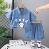 2025 Nueva Ropa Infantil Verano Manga Corta Solapa Oso Inglés Mezclilla Niños y Niñas Conjunto Bebé Color Sólido Conjunto de Dos Piezas