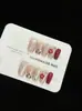 Flor DouradaMais vendido vermelho estilo francês olho de gato manicure requintada estilo atacado transfronteiriço de unhas postiças