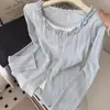 Camiseta de retazos de encaje azul con volantes estilo coreano, imitación de dos piezas, manga larga para mujer, nuevo top cárdigan abotonado de otoño