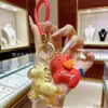 Venda Direta de Fábrica: Chaveiro de Cavalo em Ouro Puro 999 Ano do Cavalo, Pônei Dourado, Flor da Riqueza, Pingente de Celular, Charme de Bolsa