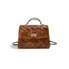 Bolso de mujer transfronterizo 2026 primavera-verano nuevo estilo pequeño bolso de mano estilo Chanel, moderno bolso de hombro y bandolera con cadena acolchada