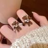 Anillo de Amor de Perlas Flocadas de Oso Naimeng para Mujer Otoño e Invierno Diseño de Nicho Anillo de Dibujos Animados Anillo de Alimentación de Cacao Caliente