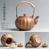 Cerámica Leña Vigas Elevadoras Hogar Cerámica Gruesa Tetera Retro Japonés Estufa Cálida para Té Cuerda Anti-Quemaduras Juego de Té Kung Fu