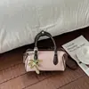 Bolsa de Mão da Moda Transfronteiriça Pequena Tote Bag Feminina Outono 2026 Nova Cor Sólida Simples Textura Versátil Bolsa de Ombro Único Transversal