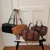 Bolso grande de alta gama para mujer, nuevo bolso de hombro versátil de otoño e invierno 2026, bolso de mano de moda, bolso tote tipo cubo