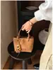 2026 Bolso tote tipo cubo de moda coreana ins, moderno, simple, versátil, casual, bolso de mano, bolso de hombro cruzado para mujer