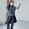 Nueva colección de otoño e invierno para niñas: Chaleco de punto de cuello alto estilo coreano, conjunto versátil de capa base, pantalones de pierna ancha y falda midi de moda para finales de otoño