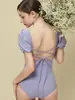 Traje de baño de una pieza para mujer 2026, escote cuadrado, mangas abullonadas, adelgazante, color liso, para aguas termales, nuevo, sin espalda, conservador, triángulo