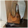 Bolso grande de mujer retro, nuevo bolso de moda de ante tipo albóndiga para el otoño de 2026, bolso cruzado informal para el día a día