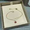 Pulseira de vestido mini Baoge V ouro totalmente cravejada em diamantes, leque pequeno em forma de leque, mini vestido de madrepérola branca, em estoque atacado CNC