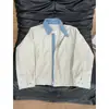 Chaqueta de moda a cuadros y retazos para hombre, temporada Primavera y Otoño 2026, estilo High Street, holgada, casual, simple, abrigo de imitación de dos piezas