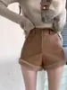 Pantalones cortos ajustados de cuero PU con retazos de pelo de cintura alta para otoño e invierno, diseño único, casual, adelgazantes para mujer