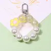Llavero de Flor con Cara Sonriente Colgante DIY para Funda de Teléfono Móvil Cubierta Protectora para Aripods Colgante para Estuche de Auriculares Joyería