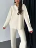 Conjunto de Malha com Zíper Cor Sólida Outono e Inverno Novo Europeu e Americano Cruzado Feminino Conjunto de Duas Peças Loungewear com Gola Alta Canelada