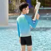 2026 Novo Modelo Roupa de Banho Infantil para Meninos, Conjunto de Duas Peças para Jovens, Shorts de Banho de Secagem Rápida de Camada Dupla Atacado