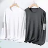 Camiseta de manga larga para hombre, nueva colección primavera/otoño 2026, capa base elástica, top de cuello redondo, versátil y moderno