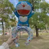 Balão de alumínio do desenho Doraemon com clipe e haste de mão para decoração de aniversário e barraca de festa