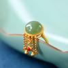 Anillo elegante y moderno que combina con todo, con borla Xiangyun y superficie de huevo de jade blanco Hetian natural con incrustaciones de plata esterlina S925