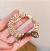 Anillo para el cabello de estilo coreano, nuevo, de cristal, para el cabello, de alta gama, con cubierta de cuero, cuerda de goma para el cabello.