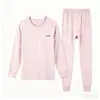 Conjunto de dos piezas de color liso con cuello redondo para casa, otoño e invierno, para niños y niñas mayores 2026, ropa interior térmica de algodón Lycra para jóvenes