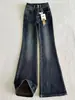Jeans boca de sino de botões duplos estilo retrô americano para mulheres, novidade do outono de 2026, cintura alta, corte justo, comprimento total, calça boca de sino