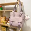 Bolsa de ombro nova com orelhas de coelho no atacado, mochila estilo japonês fresca e simples para estudantes do ensino médio, bolsa transversal para o campus para meninas do ensino fundamental