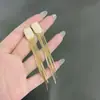 Pendientes Exquisitos de Temperamento Estilo Coreano con Borla de Piedra Ojo de Gato, Pendientes de Botón Populares Transfronterizos y Únicos con un Diseño Distintivo