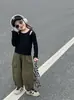 Primavera 2024 nuevo estilo coreano ropa infantil para niñas corte ajustado camiseta interior hueca de dos piezas falsas manga larga