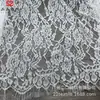 Tela de encaje Jacquard no elástica para faldas Tela de encaje con hilo de coche para ropa Fabricante de tela de encaje floral
