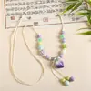 Collar con colgante de campana de mariposa de cerámica de estilo étnico retro para mujer, diseño nuevo y moderno, cadena larga para suéter, accesorios