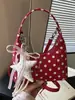 Bolso de lunares transfronterizo para mujer, nuevo modelo 2026 tipo bolsa de albóndiga, bolso de mano, bolso de hombro y cruzado de alta gama para el verano