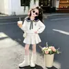 Vestido tipo traje de estilo coreano, nueva colección primavera/otoño, sudadera de muñeca a la moda y linda con un dulce lazo y falda, conjunto de dos piezas