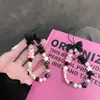 Urso Rosa Menina com Laço Preto Corrente para Pendurar Celular Pingente de Câmera CCD Corrente para Pendurar Corda de Mão Anti-Perda