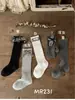 Calcetines de algodón peinado a cuadros para niños, altura media, estilo coreano, sin costuras, retro, suministro directo otoño MR231