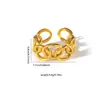Retro-chic, lujo discreto, anillo abierto de forma de serpiente de nicho, anillo de acero de titanio con estrella dorada de acero de titanio, moderno y simple.